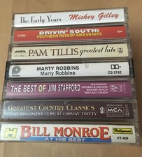 lot of seven various country music cassettes