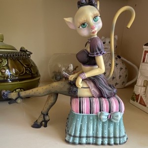 M. Le Van Resin Cat Figurine Sitting on Striped Ottoman Cushion Teal Base