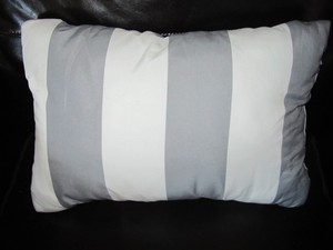 gray decorative bed pillows
