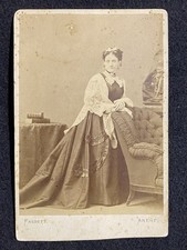 Pretty Woman Standing In Studio Antique Cabinet Photo