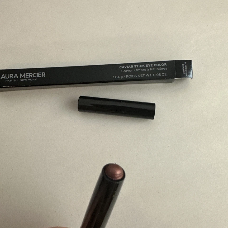 Sombra de ojos Laura Mercier Caviar Stick color bronce bruñido 0,05 oz Foto 2 de 2