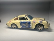 c. 1965 TPS, Porsche World News Service Car battery op. Japanese tin toy.
