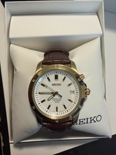 Seiko Men's SNQ012 Perpetual Calendar Leather Band Watch