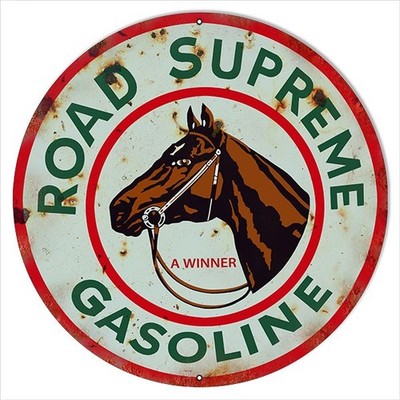 A Winner Road Supreme Gasoline Sign 24 Inches Round