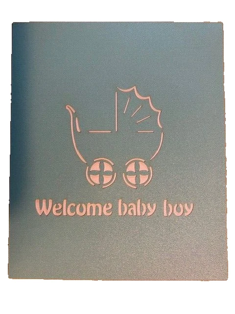 Tarjeta emergente de corte láser de una cuna con un nuevo bebé niño Foto 2 de 2