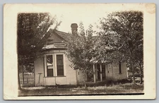 VINTAGE PHOTO POSTCARD OLD ANTIQUE PICTURE IMAGE FAMILY HOME PORCH CHAIR RPPC