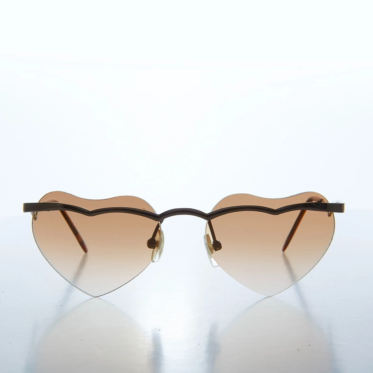 Brown heart shaped sunglasses hotsell