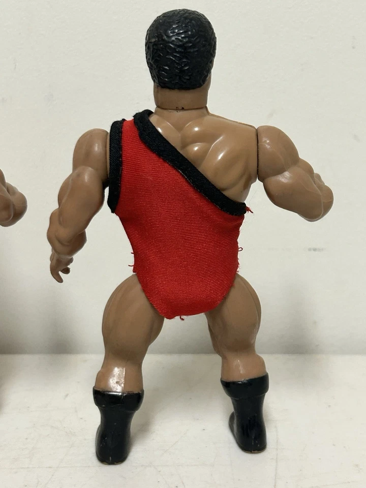 Figura de lucha libre completa AWA 1985 Remco Carlos Colón’s naranja y rojo Singlet Foto 2 de 4