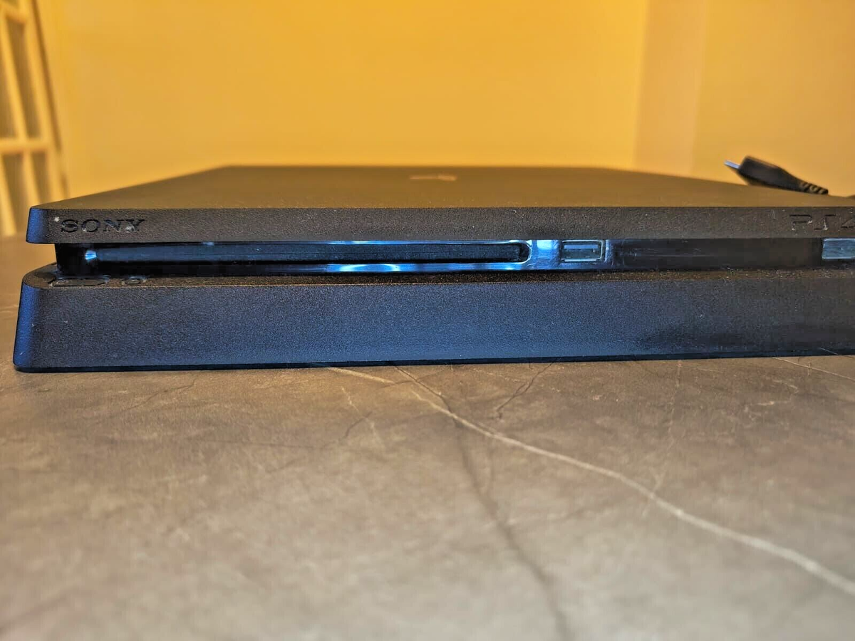 Sony PlayStation 4 Slim 1TB Console - Jet Black + 2 x Dualshock 4