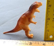 Tyrannosaurus Rex 1986 Hard Rubber Figurine Brown, Orange,  Gold 3" x 4"