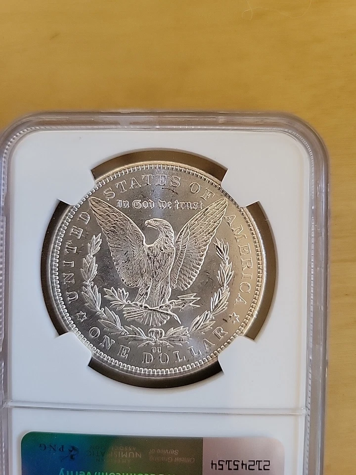 Dólar de plata Morgan 1884 CC NGC MS63 $1 como nuevo en Estados Unidos 1884-CC MS-63 anverso arco iris Foto 2 de 3
