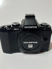 OLYMPUS OM-D E-M5 body with HLD-6 adapter