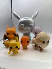 Funko Pop! Lot Of 4 - POKÉMON - Celebration Pikachu, Charizard, Mew, Charmander