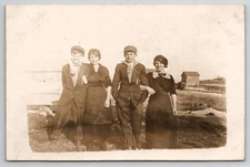 RPPC  Ladies With Handsome Young Men On Farm North Dakota Family Postcard J43