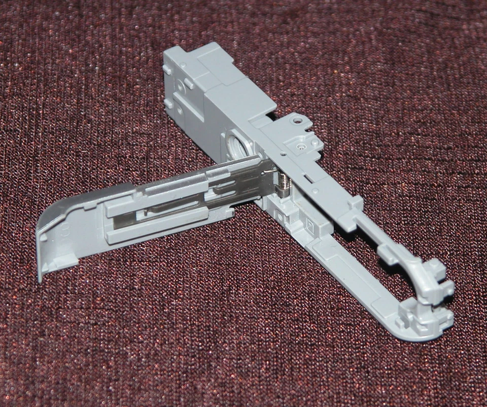 Marco inferior con cubierta de batería para cámara digital Casio EX-Z850 - Piezas de reparación Foto 2 de 3