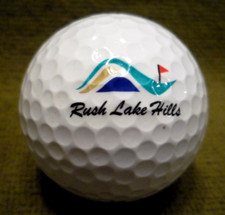 RUSH LAKE HILL Golf Course logo golf ball Pinckney, MI unused D.11