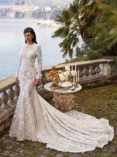 Elegant Wedding Dresses O-Neck Bridal Gowns Lace Appliques Full Sleeves Backless