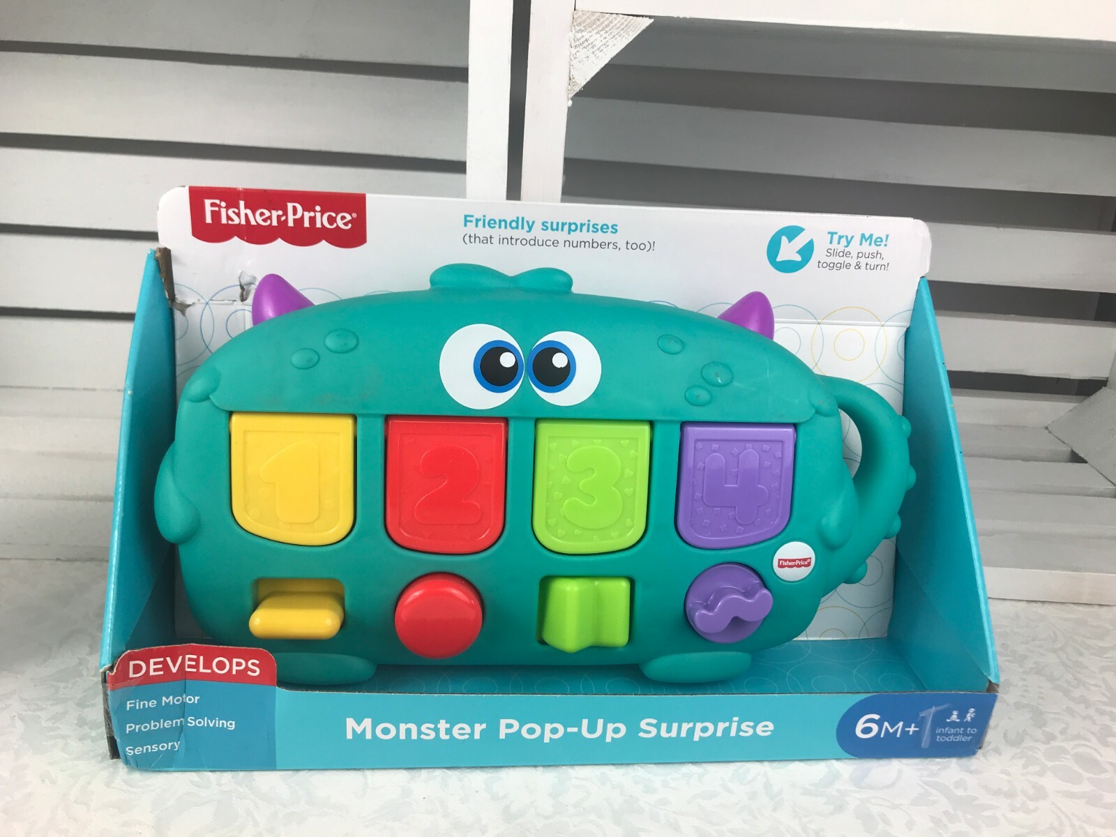 monster pop up fisher price