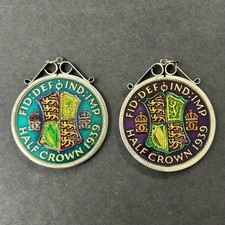 Two silver George V 1939 enamelled half crowns, both in silver mounts.