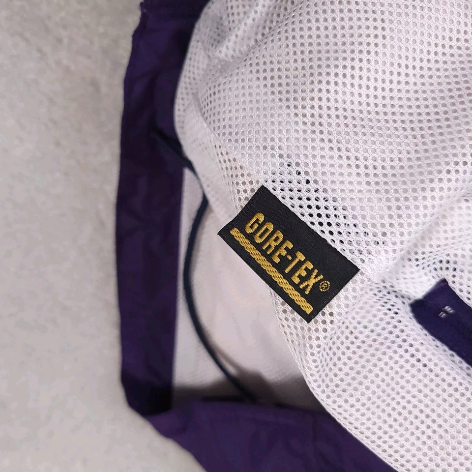 Chaqueta deportiva Road Runner para correr al aire libre para mujer forrada en púrpura mediana Foto 2 de 4