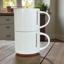 Starbucks 2012 Gold Letters Red Trim White Stackable Coffee Cup Mug 16 oz SET