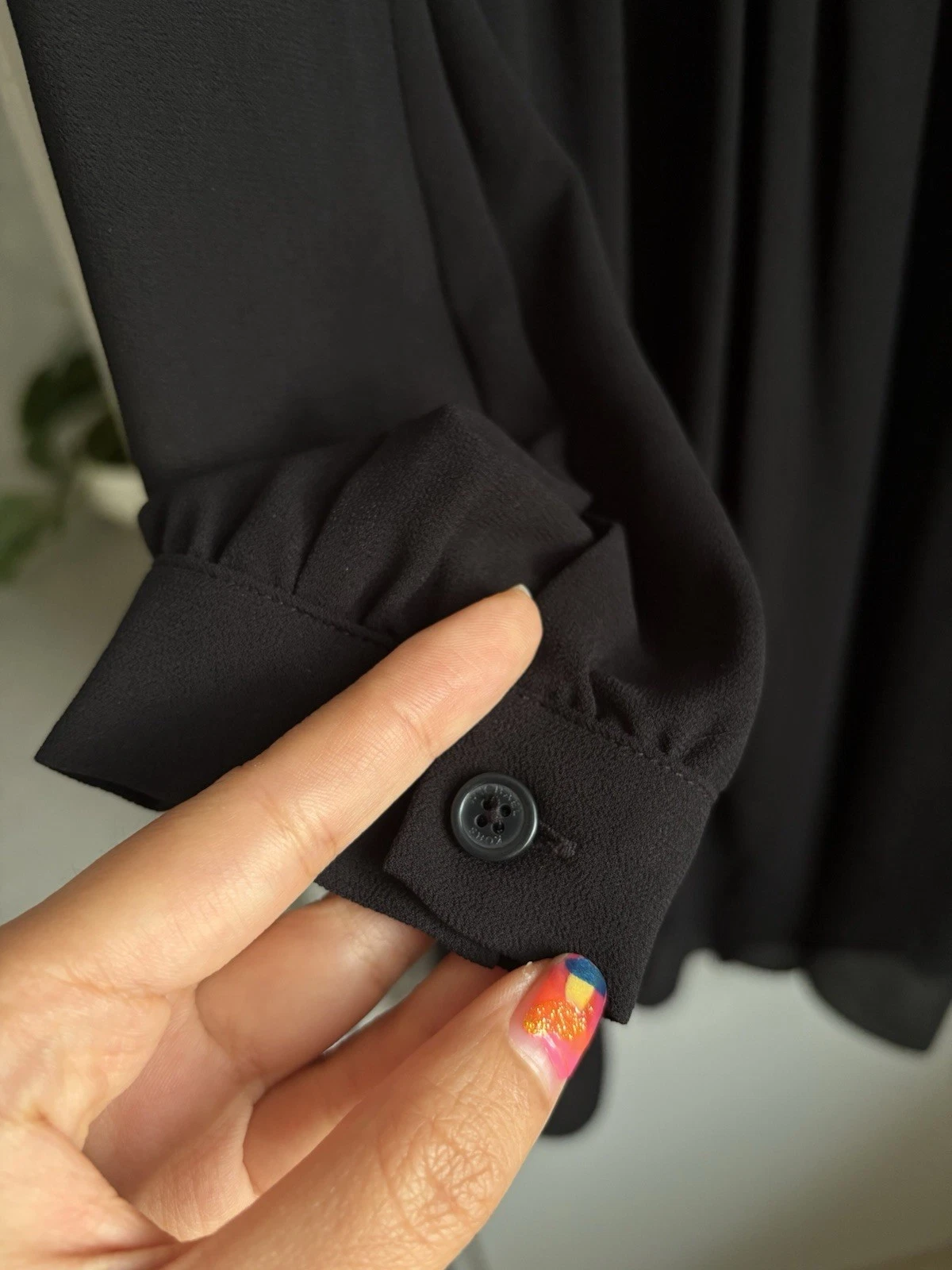 Mini abito nero Michael Kors foderato con volant scollo a V manica lunga prezzo consigliato £ 200+ 