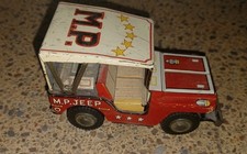VINTAGE 4 1/4 INCH "MP" MILITARY POLICE RED TIN FRICTION JEEP TOY WORKS GREAT
