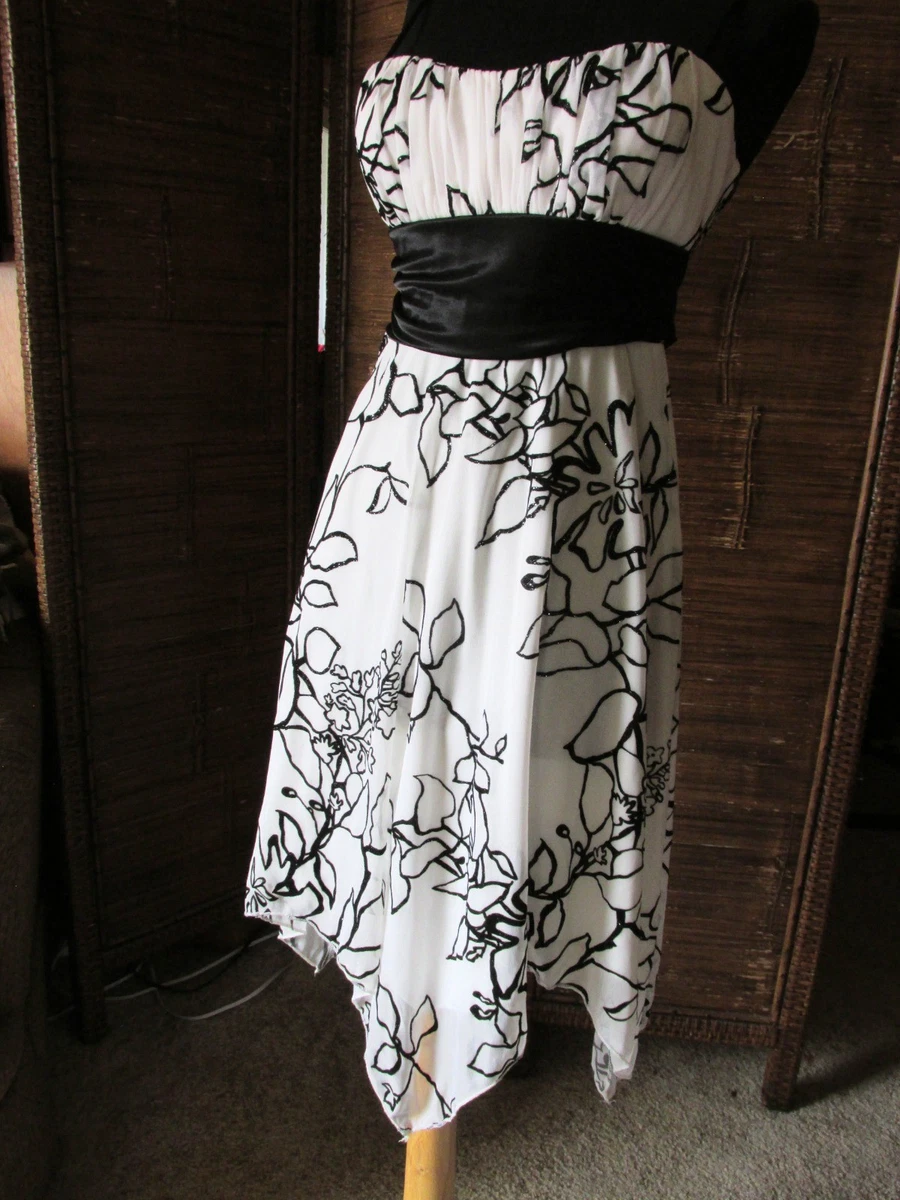 black white vintage dress Women's Retro 1950s Tea Dresses Midi Daily Date Ruched Print Note Crew Neck Sleeveless Slim Summer Spring 2023 S M L XL 2026 the dress comes with adjustable and removable halter straps Bill Brandt - "1951 Dress"