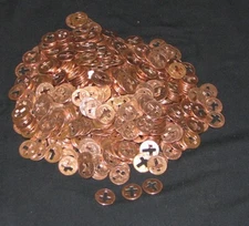 500 pennies with a cross cut out of center