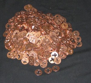 500 pennies with a cross cut out of center