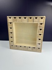 Square wooden advent calendar display with drawers. Brand new