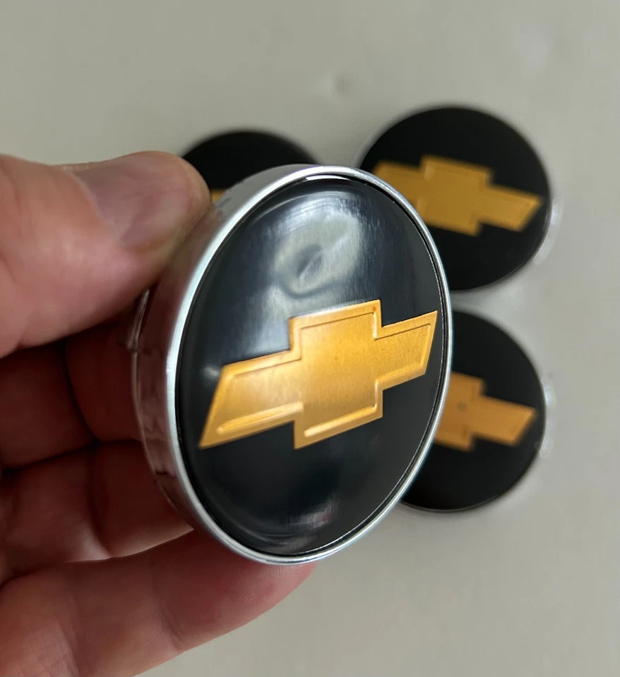 Tapacubos centrales de rueda Chevy negros 4x para Chevrolet Aveo 2006-2011 Foto 4 de 4