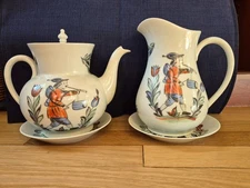 D Porthault Limoges Teapot and Creamer with peasant boy design