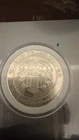 American Argent Mint Ltd World Trade Shield 1 Oz .999 Fine Silver Round