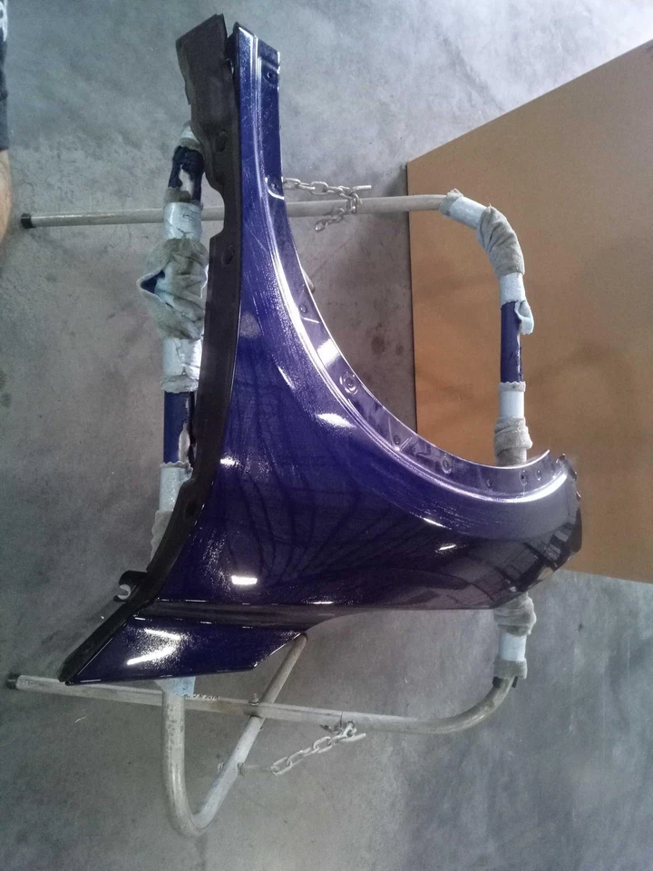 Guardabarros delantero izquierdo Nissan Rogue 2024 azul 710033 usado 29 k millas Foto 2 de 4