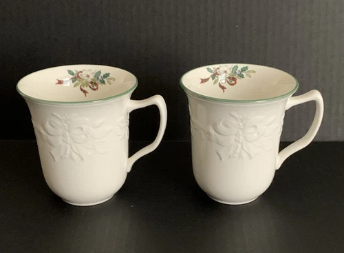 2 Mikasa HOLIDAY SEASON Christmas Coffee Mugs Embossed Holly Ribbon