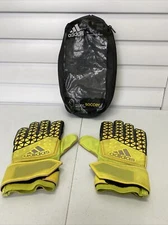 Pair of Adidas soccer goalie gloves, size 8, snug fit, bag has the date 2014