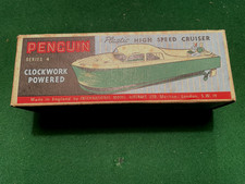 Boxed Vintage Penguin Clockwork High Speed Cruiser No 4 Boat  with key