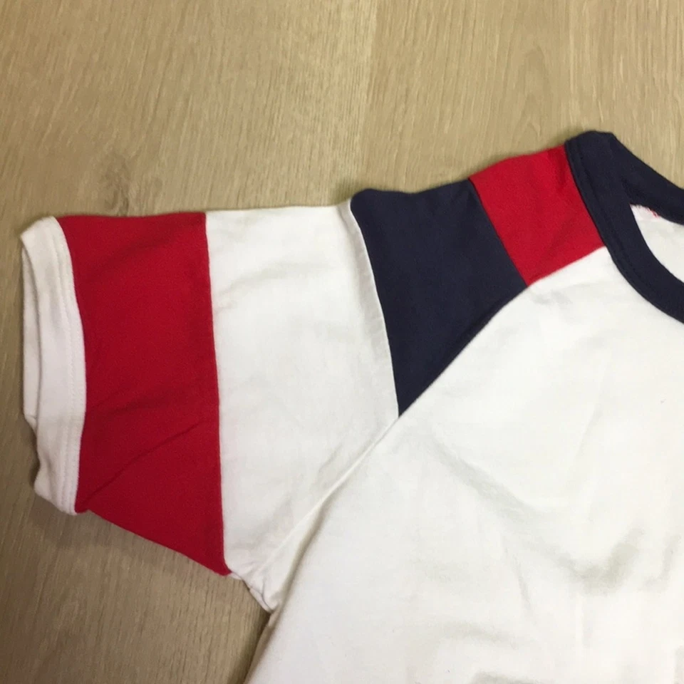 Camiseta Hanna Anderson Rocket Gráfica Patriótica Blanca, Roja y Azul Usada en Excelente Condición Foto 4 de 4