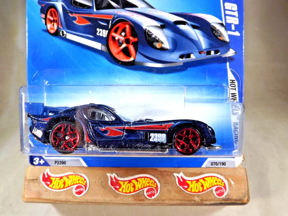Hot Wheels #70 HW Racing 2009 4/10 Panoz GTR-1 variación azul oscuro con 5 rayos rojos Foto 2 de 4