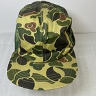 Olive green and brown camouflage Vtg hat with mesh front and dark green logo on the side, size large USA made.