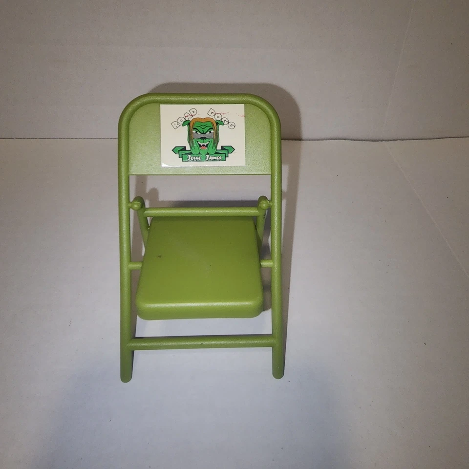 Figura de acción Road Dog Jesse James silla plegable lucha libre verde Foto 4 de 4