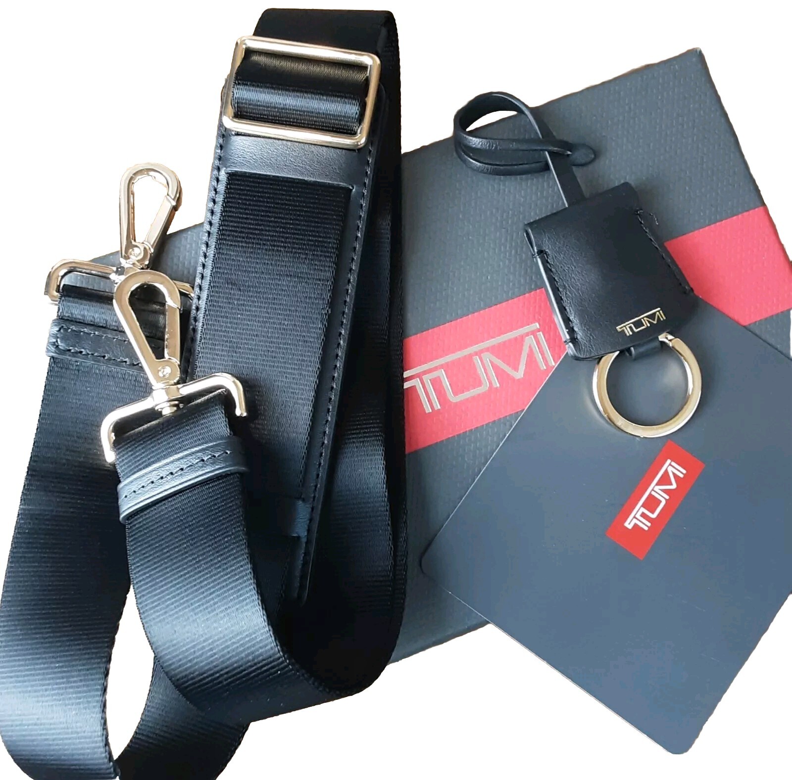 New Tumi Luggage Set Of Strap And Leather Tag in Black with Gold in Tumi Box.