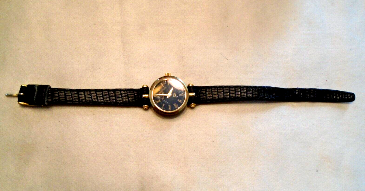 VINTAGE GUCCI LADIES WATCH GOLD & BLACK SWISS MADE 4200M VINTAGE GUCCI LADIES WATCH GOLD & BLACK SWISS MADE 4200M