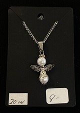 Really cute butterfly pearl pendant on 20 inch curb chain