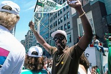 Sam Vincent Boston Celtics celebrates at a parade after winning v - Old Photo