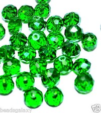 wholesale strings of AAA green faceted glass crystal rondelle beads of 8 & 10 mm