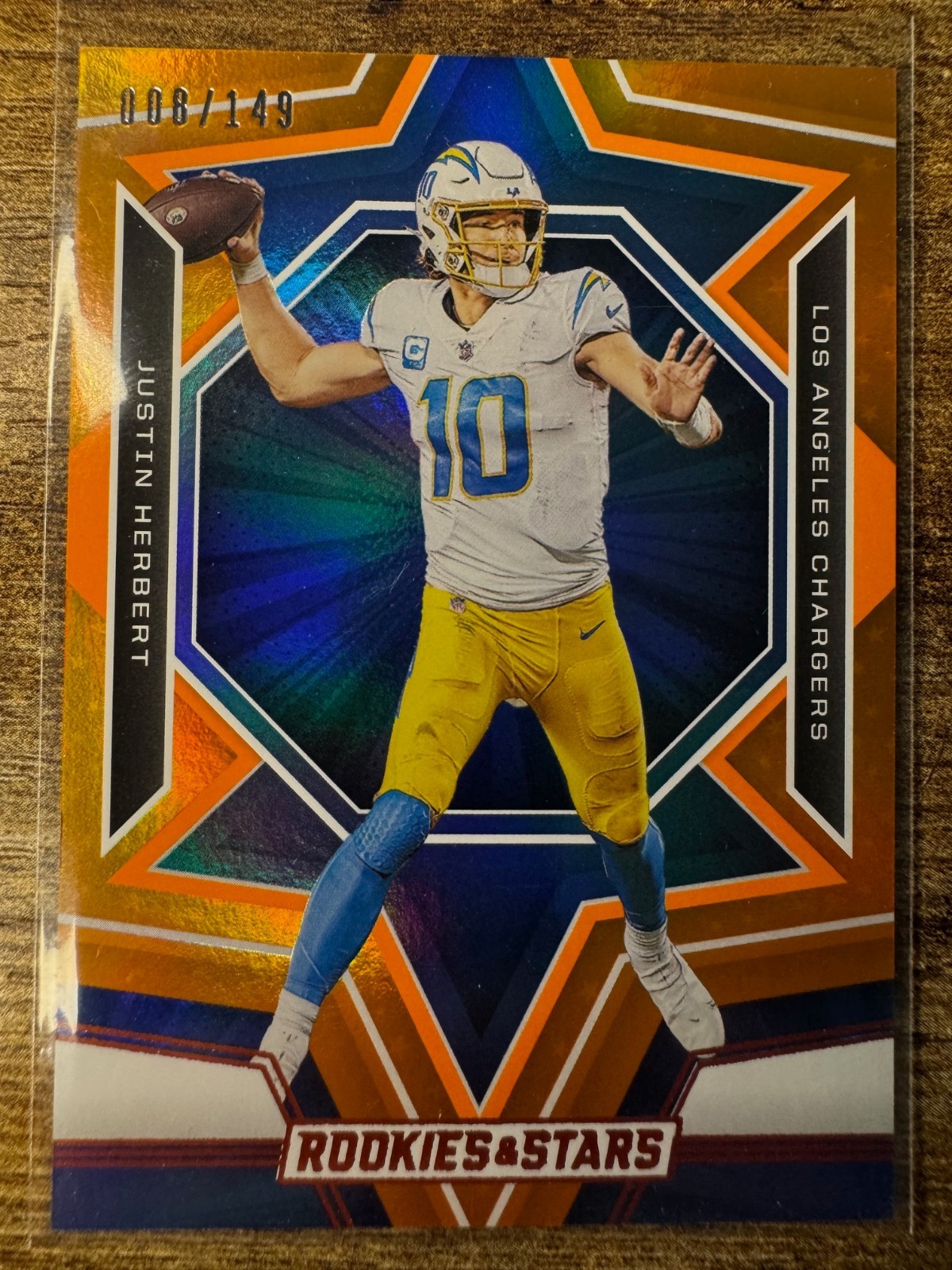 JUSTIN HERBERT 2023 Panini Rookies & Stars #58 Orange Parallel #008/149 CHARGERS