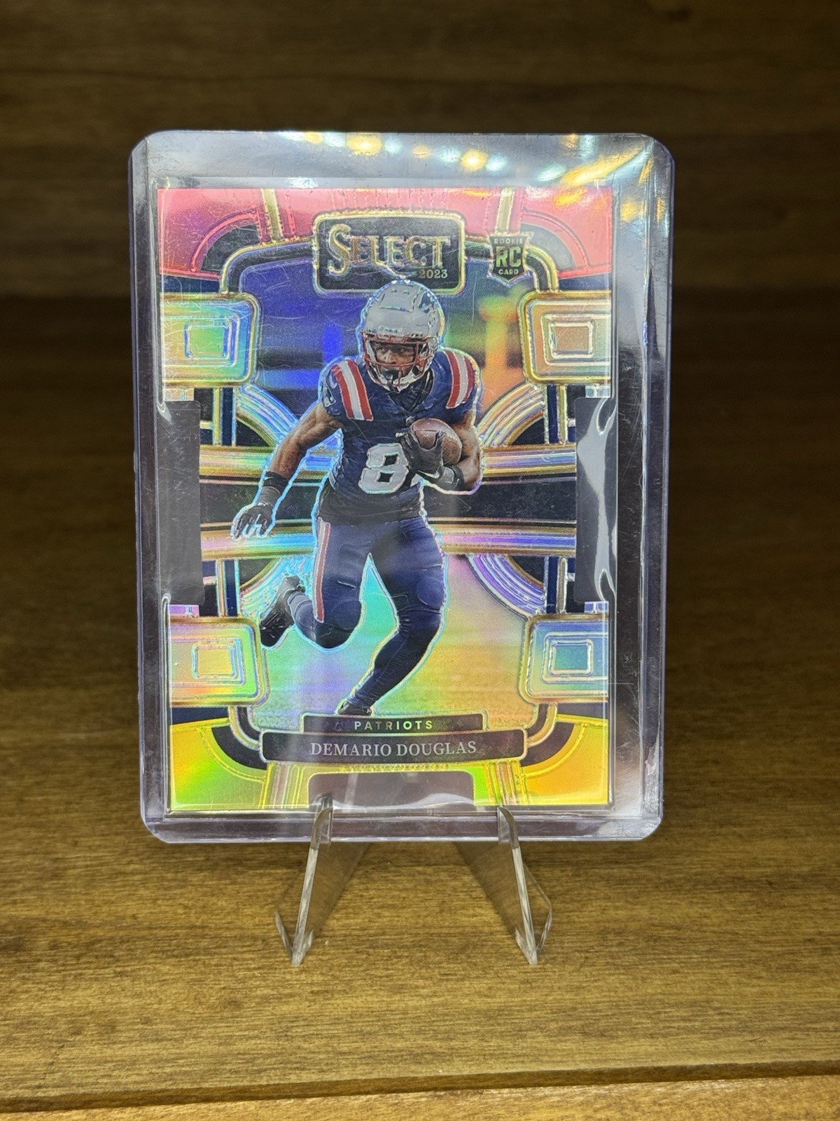 2023 Panini Select Demario Douglas - Concourse #68 Red & Yellow Prizm Die-Cut