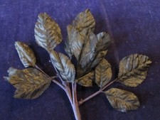 Millinery Flower Black Fabric 1 3/4-2 1/4" Leaves 18 on Stem K16